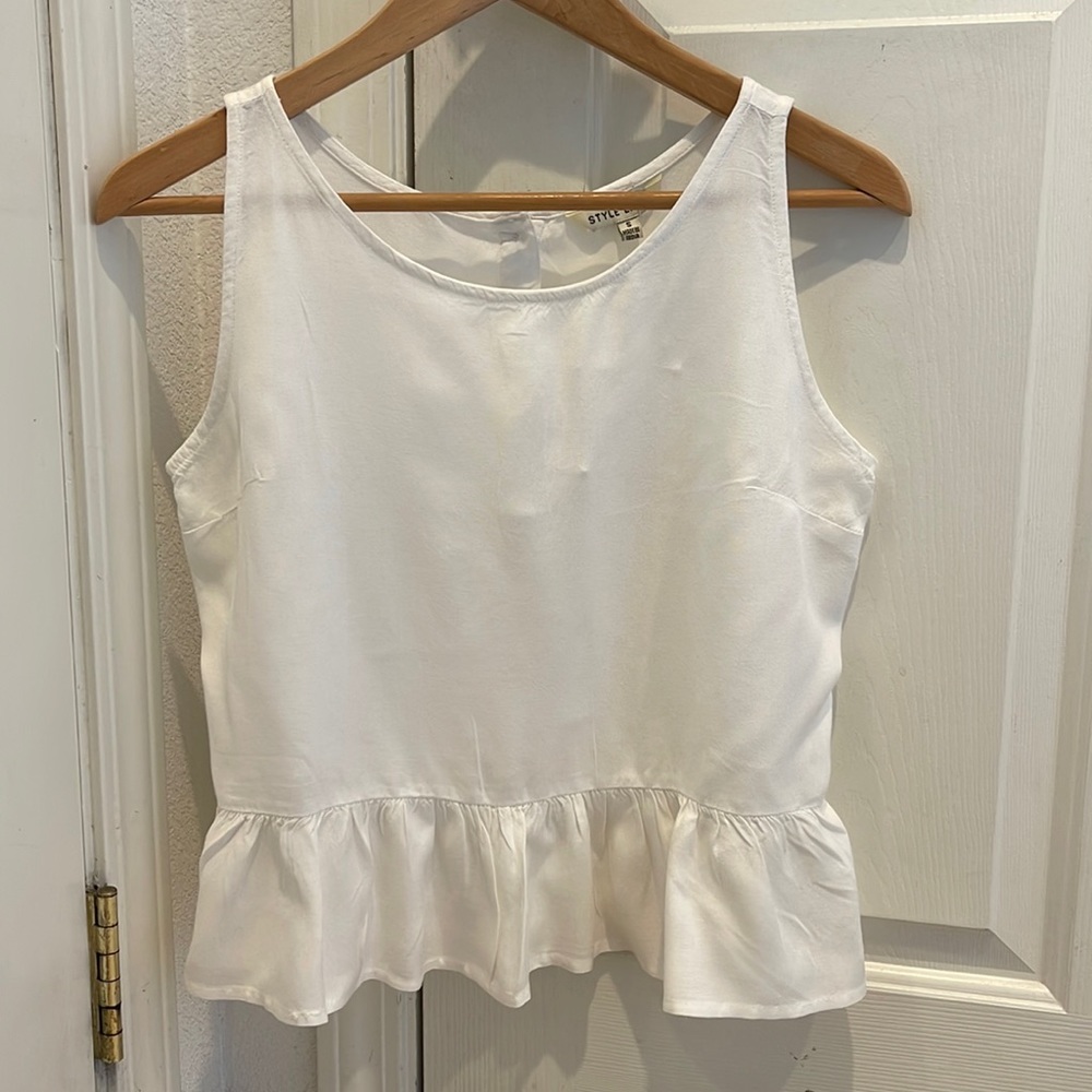 White sleeveless top